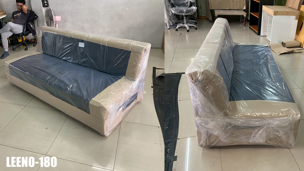 85012::LEENO::An Itoki modern sofa with cotton/PVC leather seat. Dimension (WxDxH) cm : 160/180/190x83x73 ITOKI SOFA BED