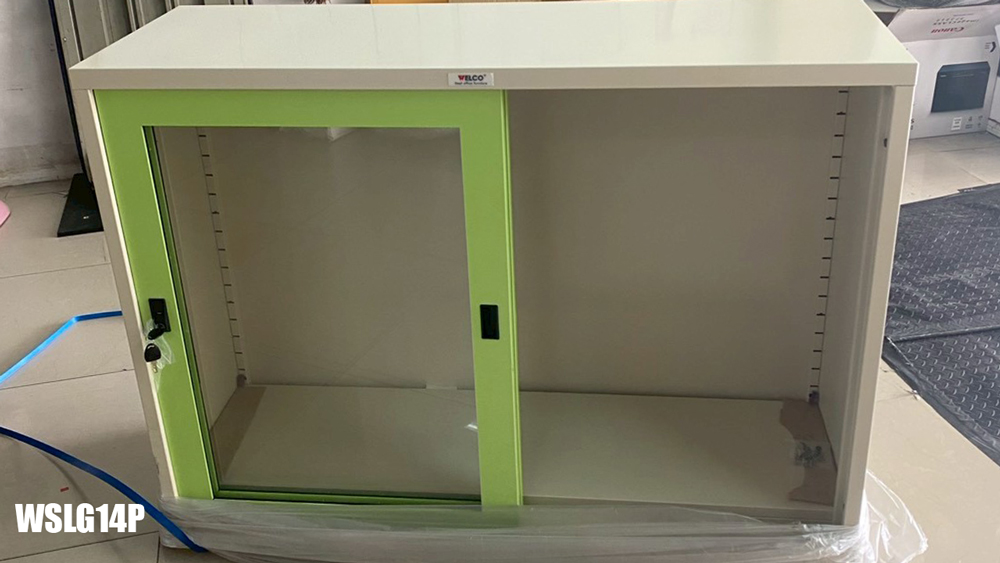94004::WSLG-14::A Welco steel cabinet with sliding glass doors. Dimension (WxDxH) cm : 118.5x40.6x87.8. Available in Orange-White, Blue-White, Purple-White and Green-White Metal Cabinets